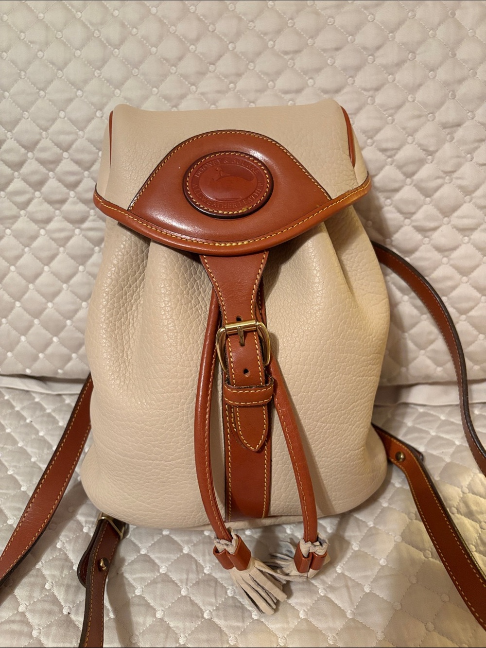 Dooney & Bourke Cream and Brown Leather Drawstring Backpack